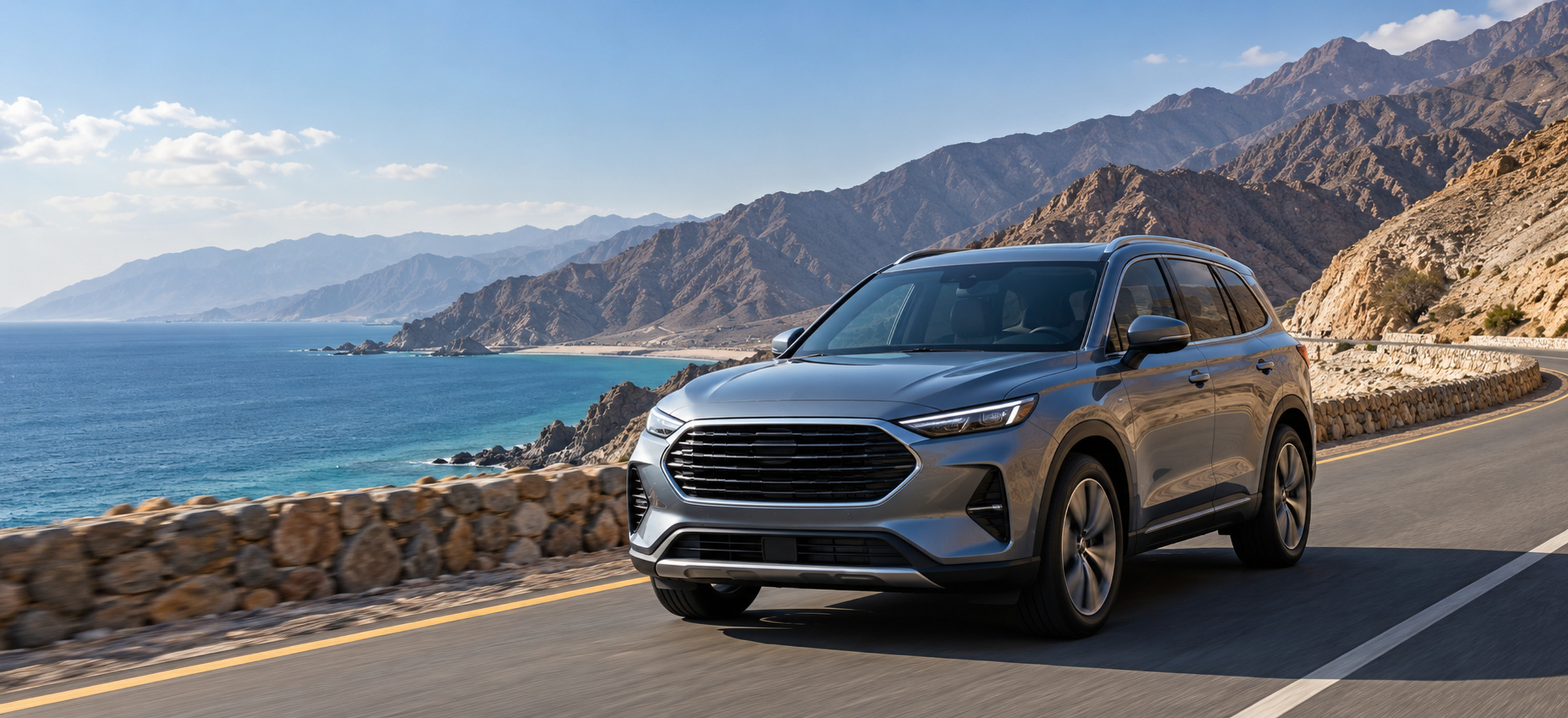 Clean car on a coastal road in Fujairah with mountains and sea, wide, generic unbranded car, no logo, no plate